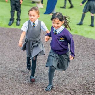 an image of children playing on Rubber Mulch